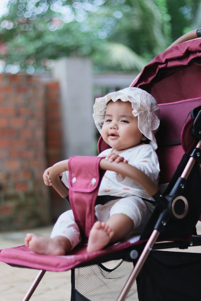 do you really need a stroller? new parents walking with baby stroller